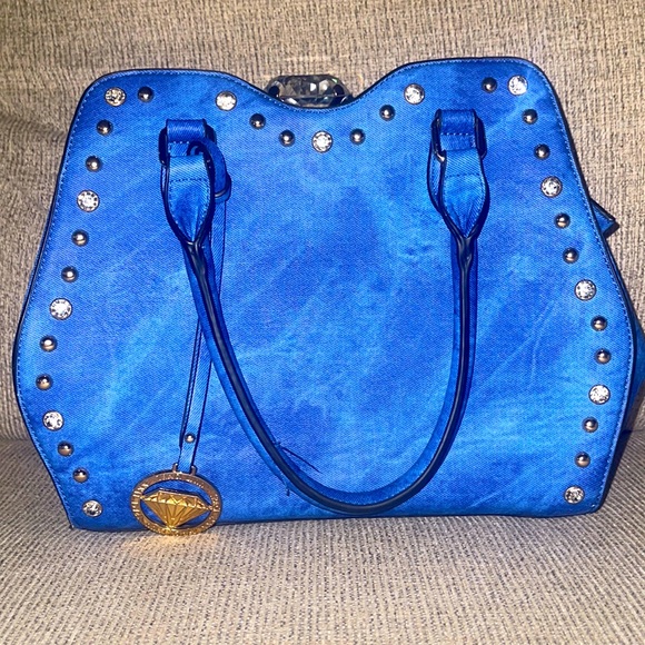Traci Lynn Woman’s handbag. - Picture 1 of 4